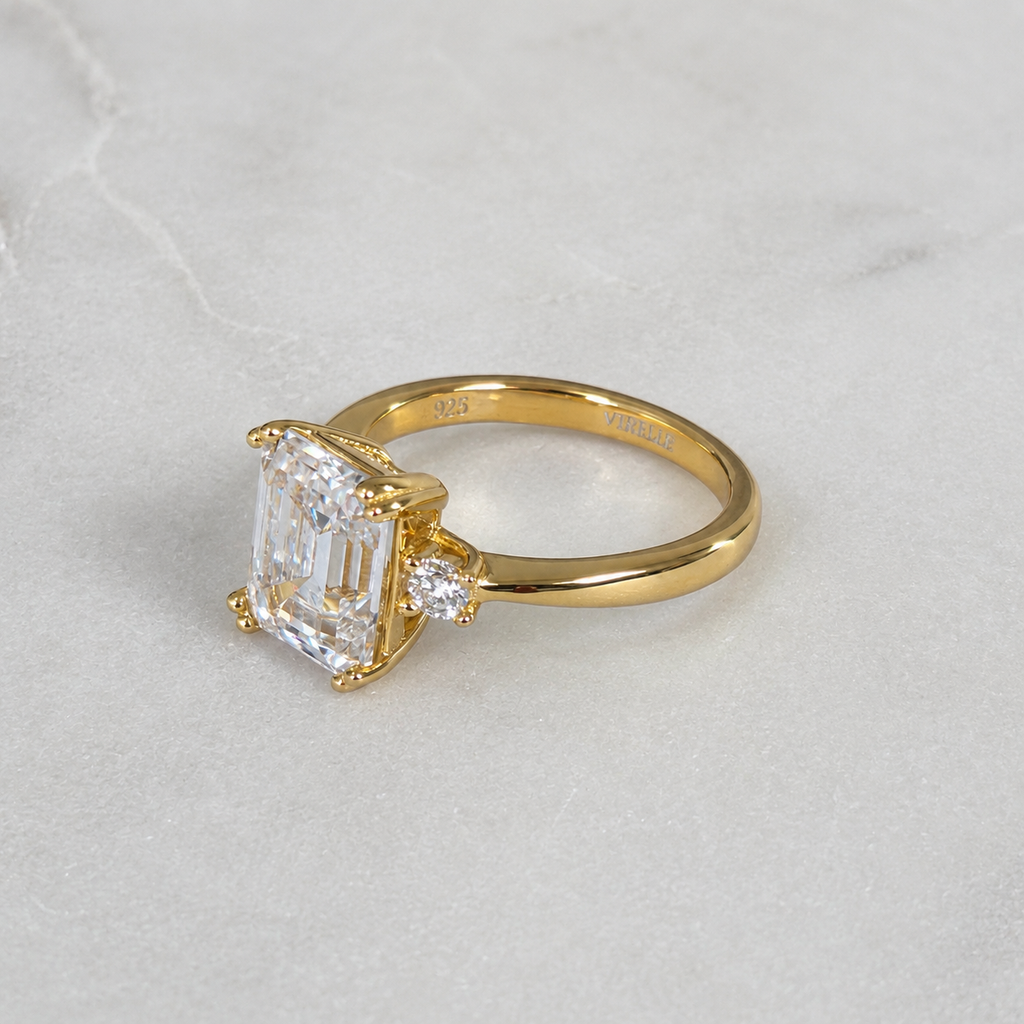 THREE-STONE EMERALD-CUT MOISSANITE RING - 4.4ct