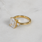 THREE-STONE EMERALD-CUT MOISSANITE RING - 4.4ct
