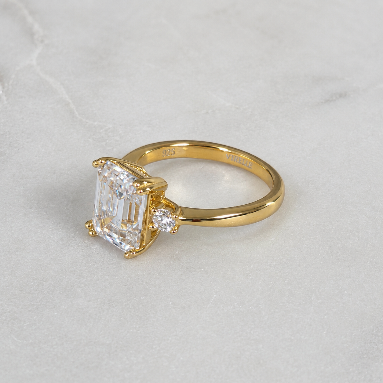 THREE-STONE EMERALD-CUT MOISSANITE RING - 4.4ct