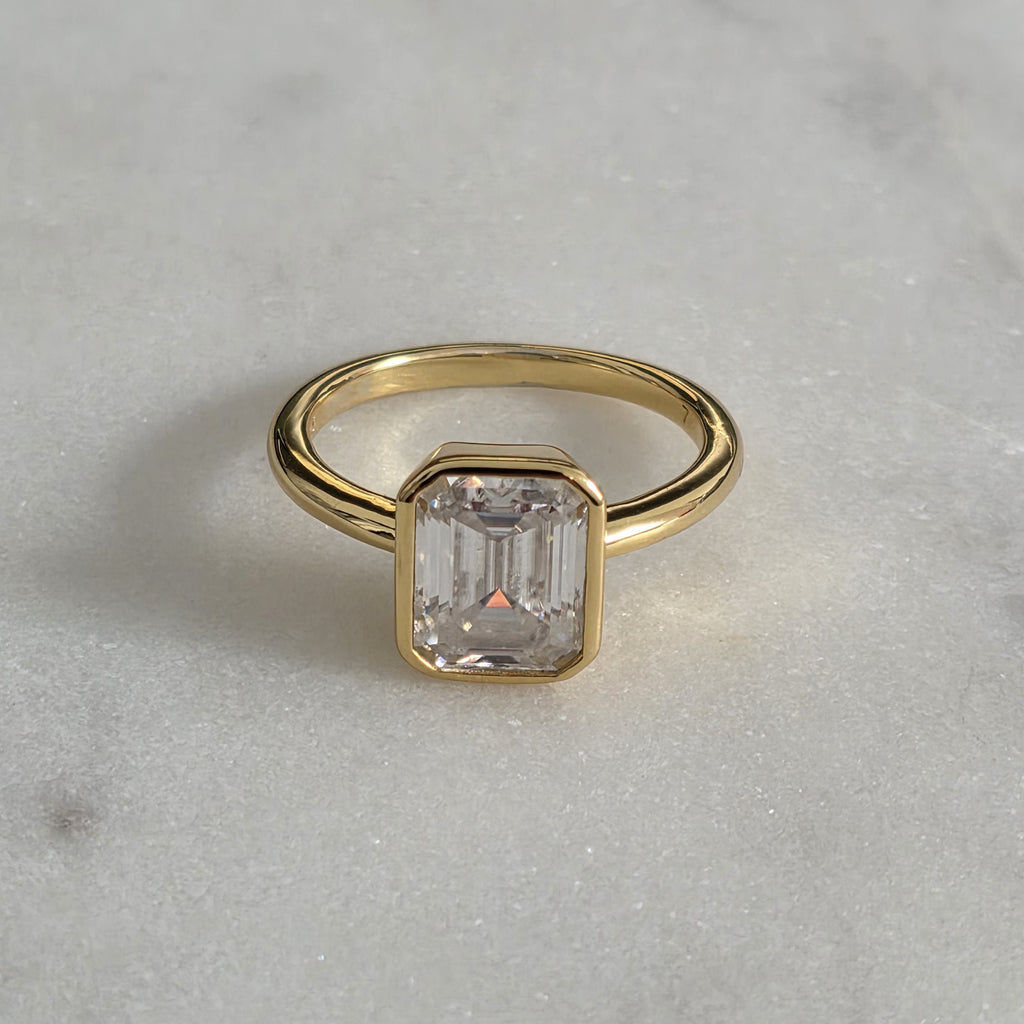 SOLITAIRE EMERALD-CUT BEZEL MOISSANITE RING - 3.0ct