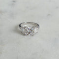 THREE-STONE CUSHION-CUT MOISSANITE RING - 4.63ct