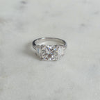 THREE-STONE CUSHION-CUT MOISSANITE RING - 4.63ct
