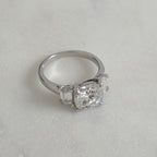 THREE-STONE CUSHION-CUT MOISSANITE RING - 4.63ct
