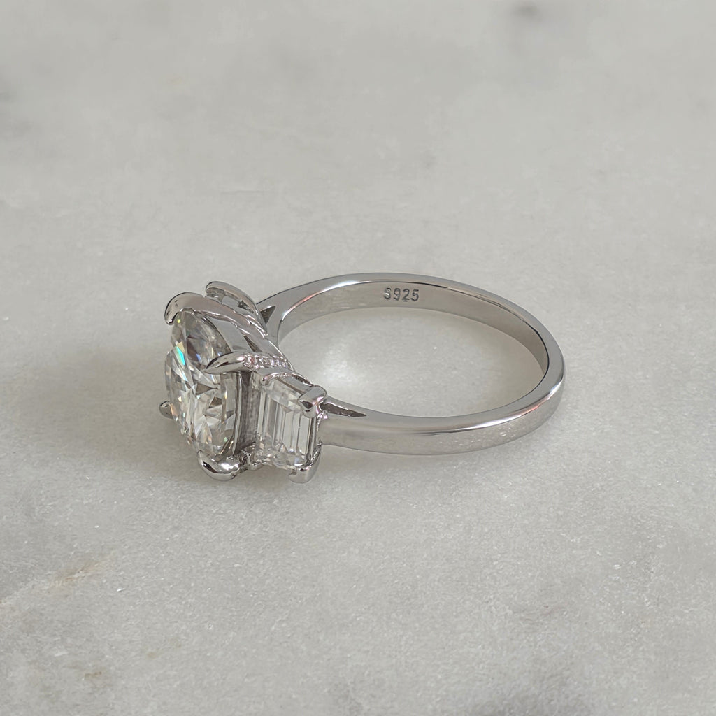 THREE-STONE CUSHION-CUT MOISSANITE RING - 4.63ct