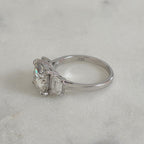 THREE-STONE CUSHION-CUT MOISSANITE RING - 4.63ct