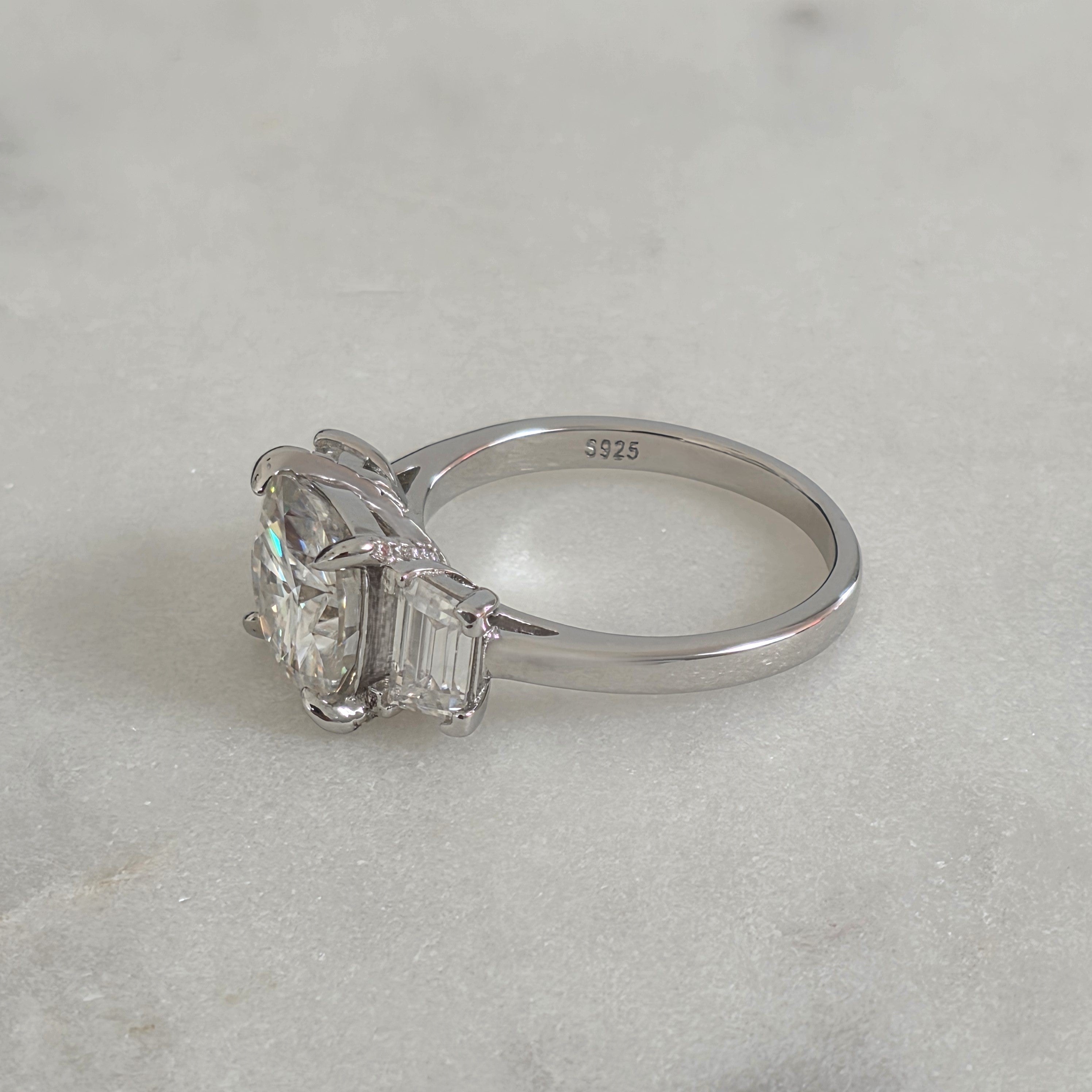 THREE-STONE CUSHION-CUT MOISSANITE RING - 4.63ct