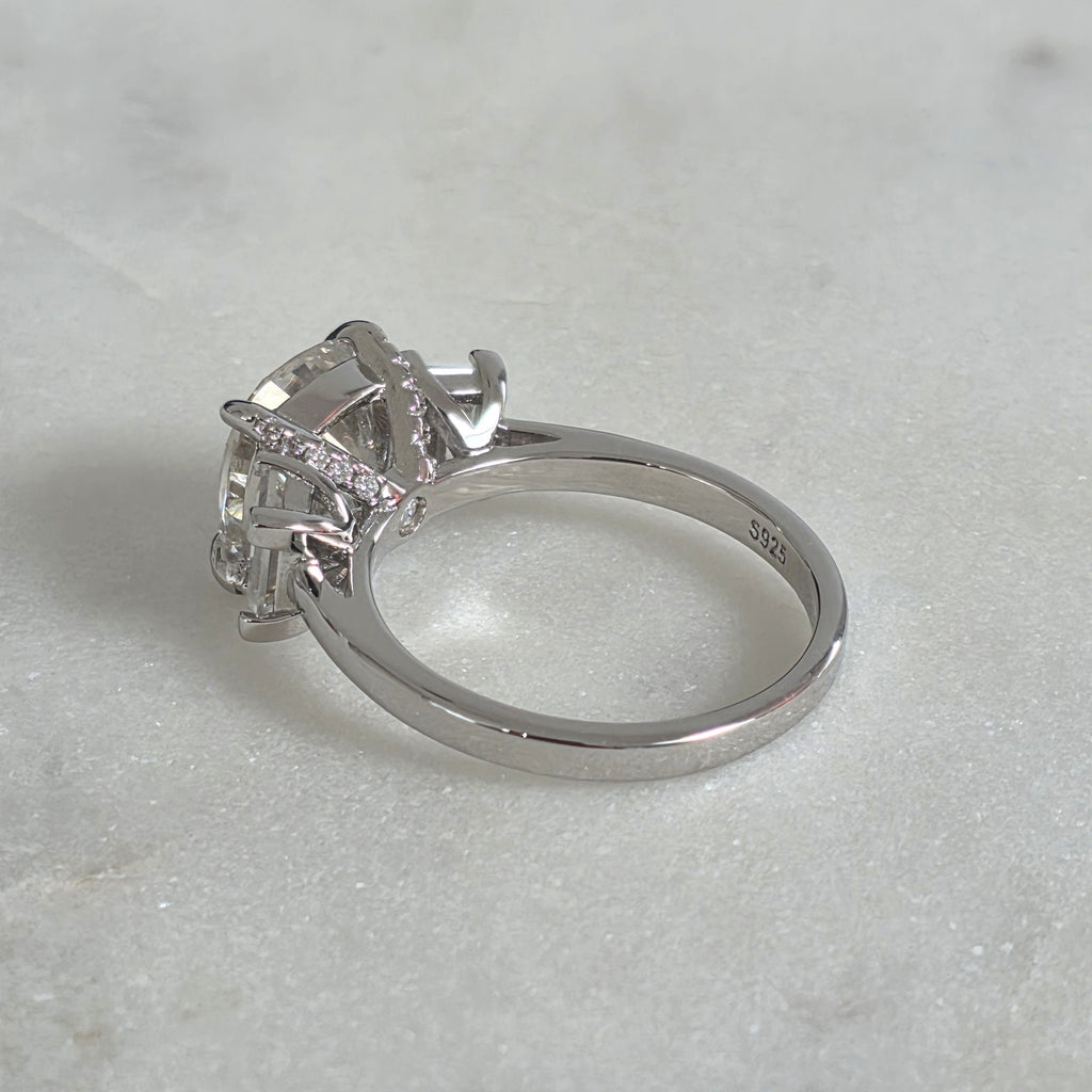 THREE-STONE CUSHION-CUT MOISSANITE RING - 4.63ct