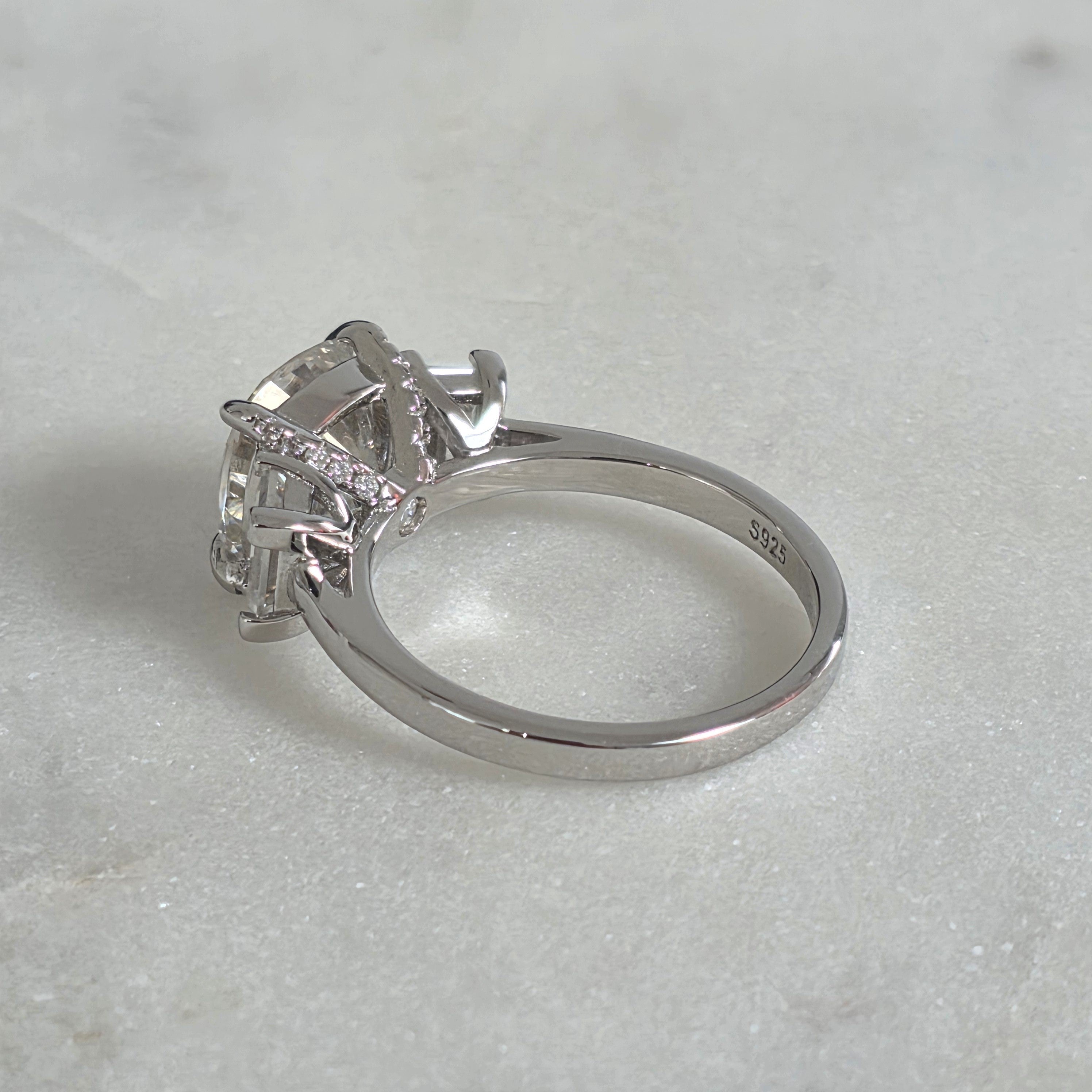 THREE-STONE CUSHION-CUT MOISSANITE RING - 4.63ct