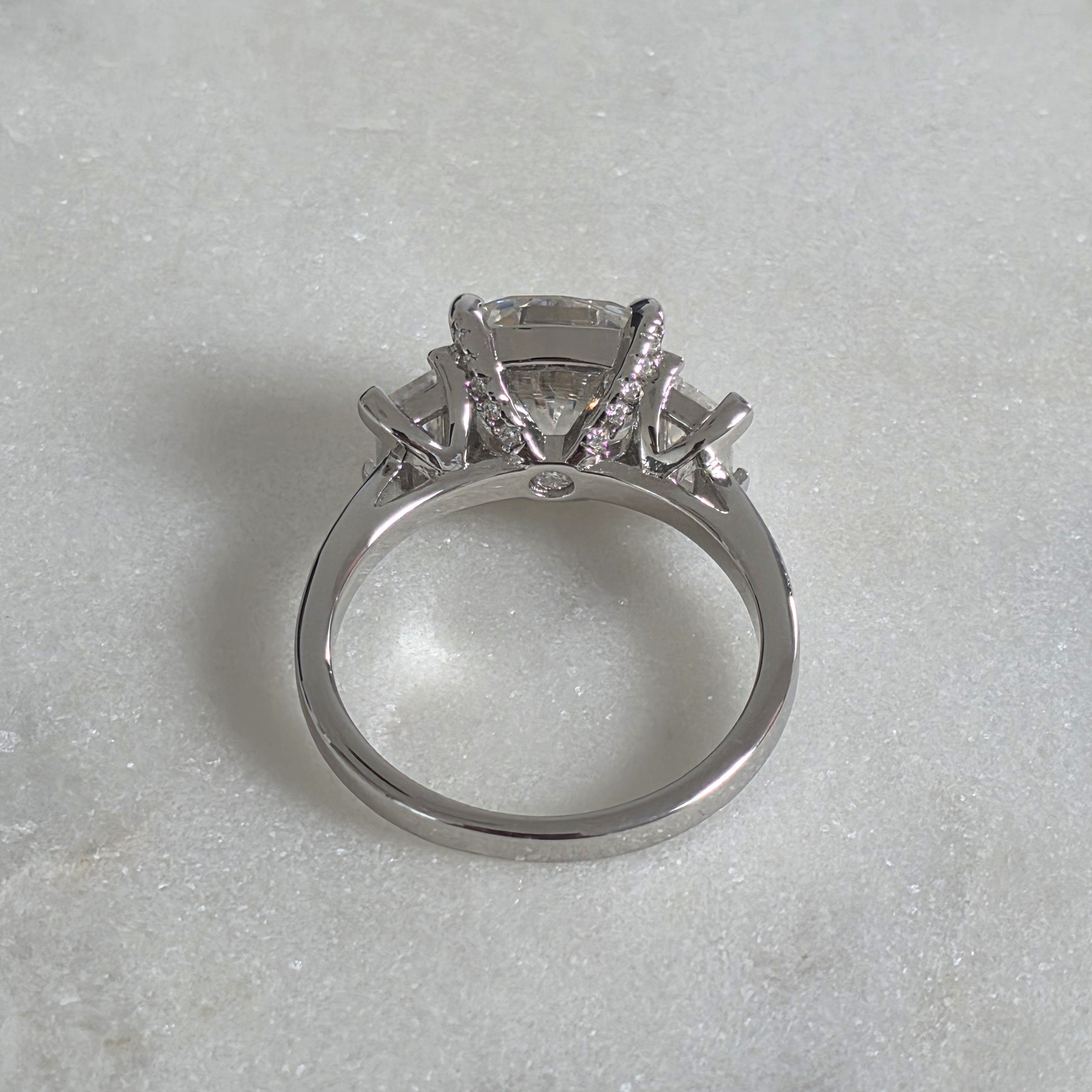 THREE-STONE CUSHION-CUT MOISSANITE RING - 4.63ct