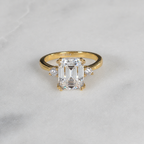 THREE-STONE EMERALD-CUT MOISSANITE RING - 4.4ct
