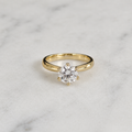 CLASSIC SOLITAIRE 6-PRONG ROUND-CUT MOISSANITE RING - 1.0ct