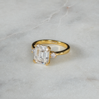 THREE-STONE EMERALD-CUT MOISSANITE RING - 4.4ct