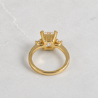 THREE-STONE EMERALD-CUT MOISSANITE RING - 4.4ct